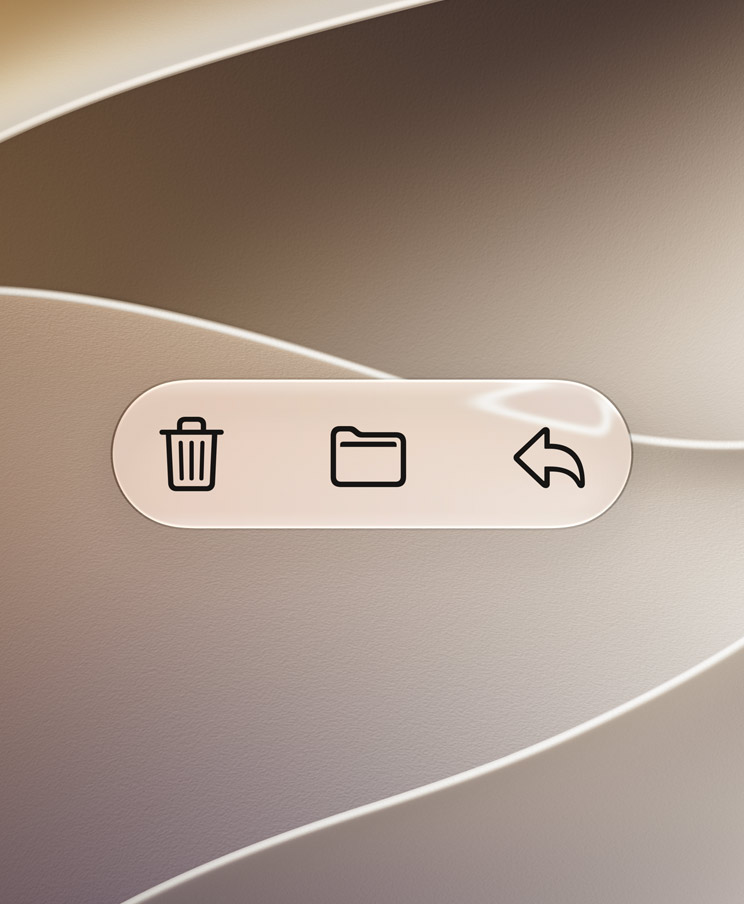 A Liquid Glass toolbar with bin, folder and reply icons, floating above a soft background. Image: Apple